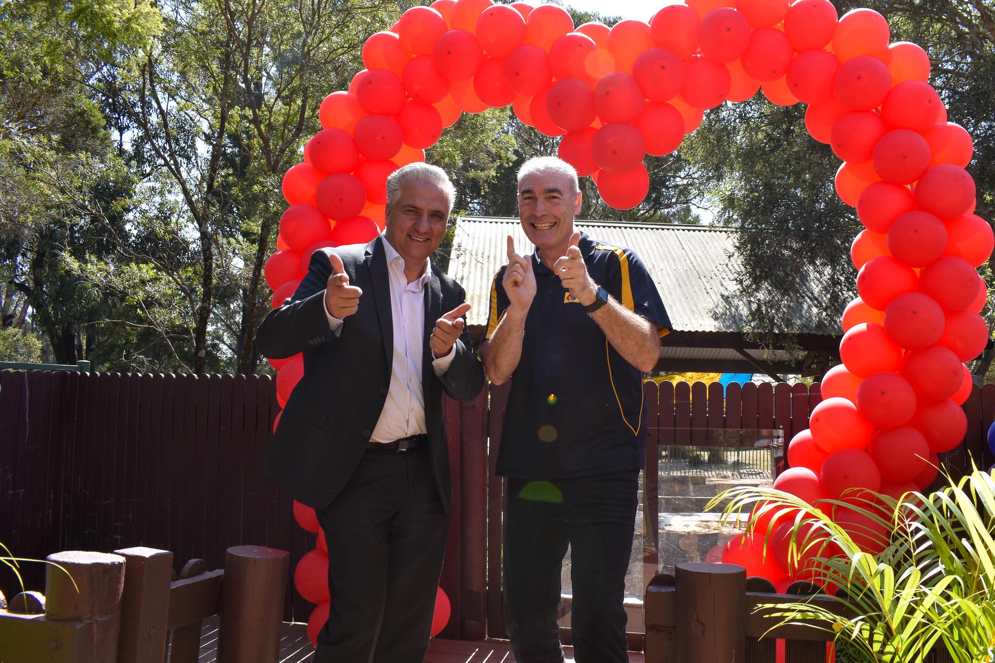 Yellow wiggleposing next to Mayor Frank Carbone